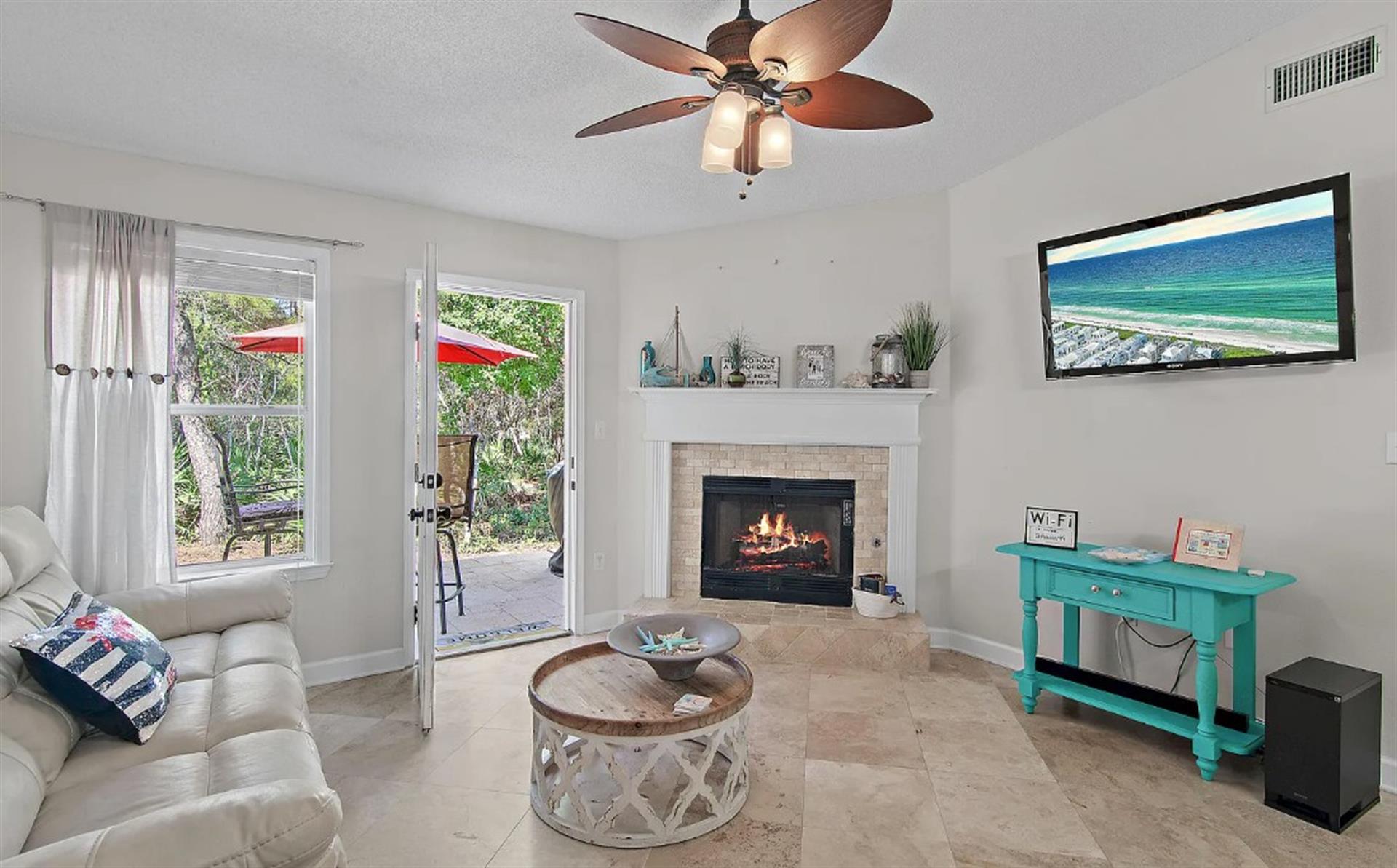 Unwind in your cozy living room with coastal vibes throughout.