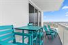 Balcony Dining Area and Lounge Chairs