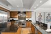 Spacious chefinspired kitchen with ample counter space for family meal prep