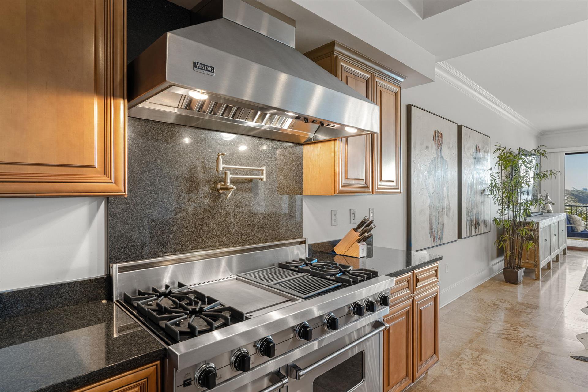Cook like a chef in this gourmet kitchen with professionalgrade Viking appliances and granite countertops.