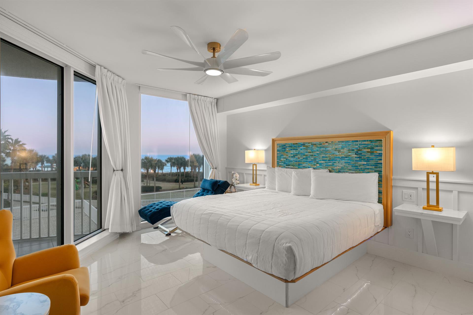 Drift off in your oceanfront King suite, where tropical breezes flow through floortoceiling windows and soft linens await your arrival.