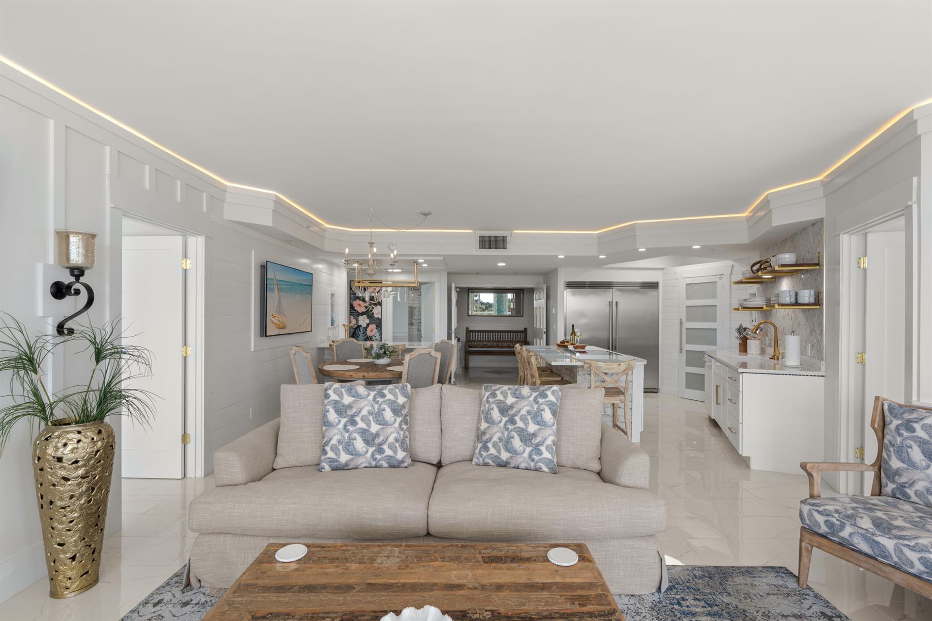 Your spacious openplan living area flows seamlessly into a gourmet kitchen, perfect for gathering and creating memories together.