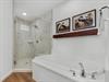 Separate Shower and Soaking Tub in Bathroom 1