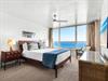 Wake up to stunning ocean views from Bedroom 1 with crisp linens, stylish furnishings, and endless blue horizons.