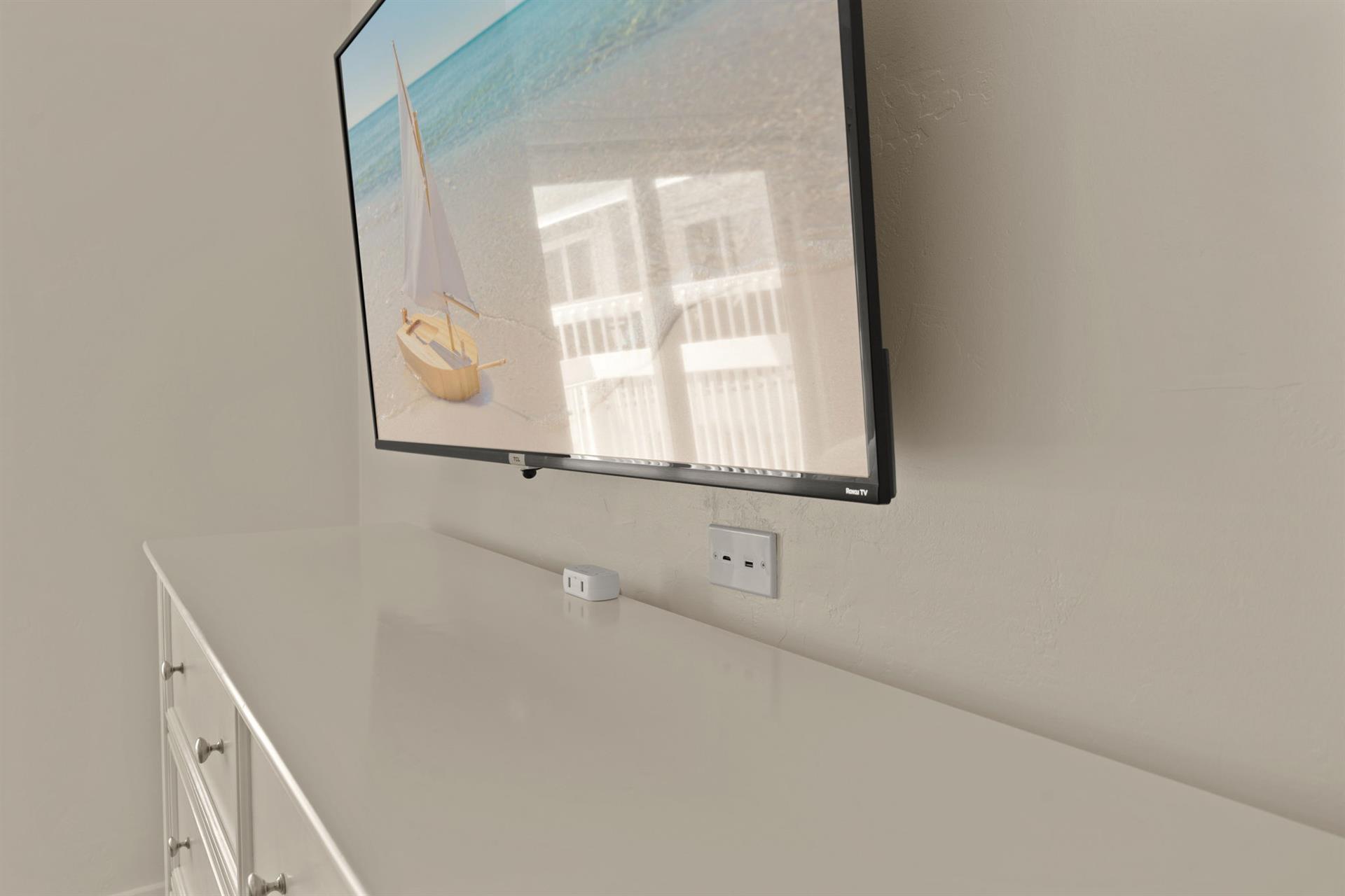 Bedroom 2 with convenient charging ports