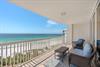 Unwind on your private oceanfront balcony with panoramic beach views. Comfortable seating awaits for morning coffee or evening sunsets over pristine Gulf waters.