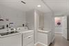 Your bright, dedicated laundry space makes staying fresh effortless with fullsize washer and dryer plus convenient utility sink for all your needs.
