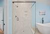 Soaking Tub and WalkIn Shower in Primary Bathroom 7