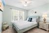 Bedroom 2  Drift off to peaceful sleep in your serene coastalthemed bedroom, complete with soft linens