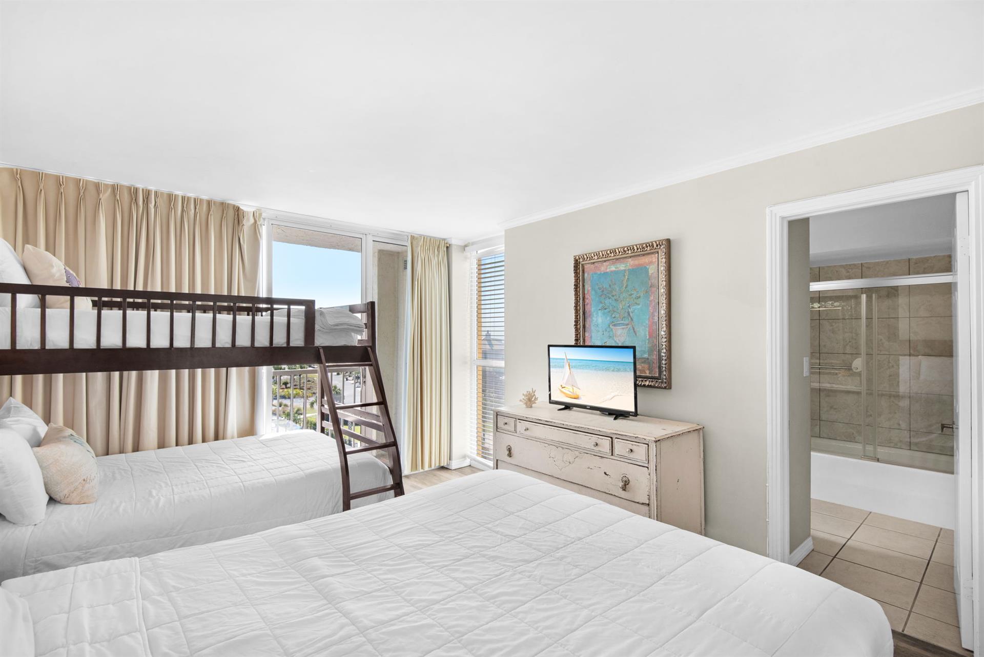 Bedroom 2 with flat screen tv.