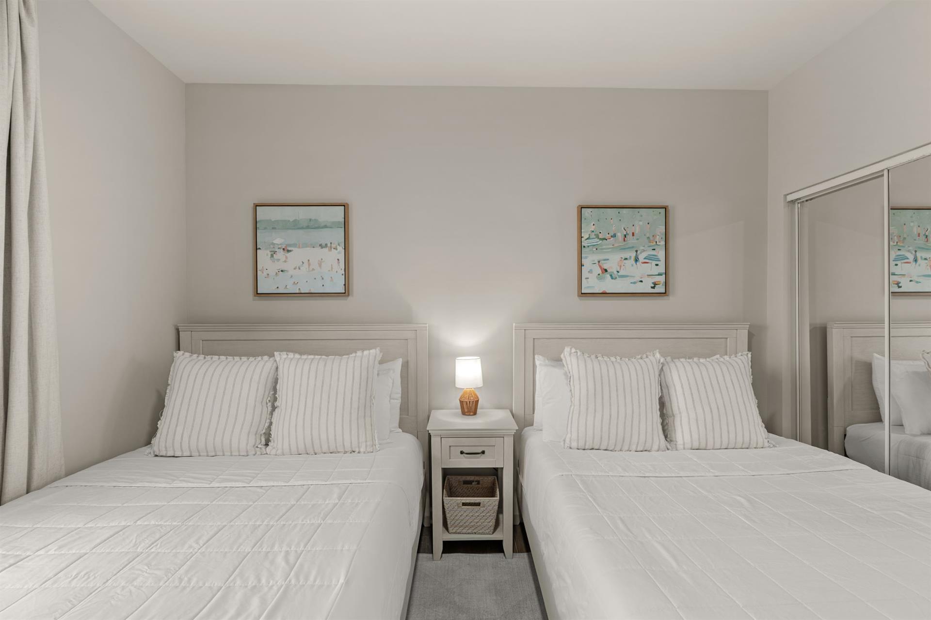Bedroom 2 with 2 double beds.