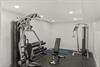 Your private fitness sanctuary awaits with professionalgrade equipment for strength training and cardio workouts.