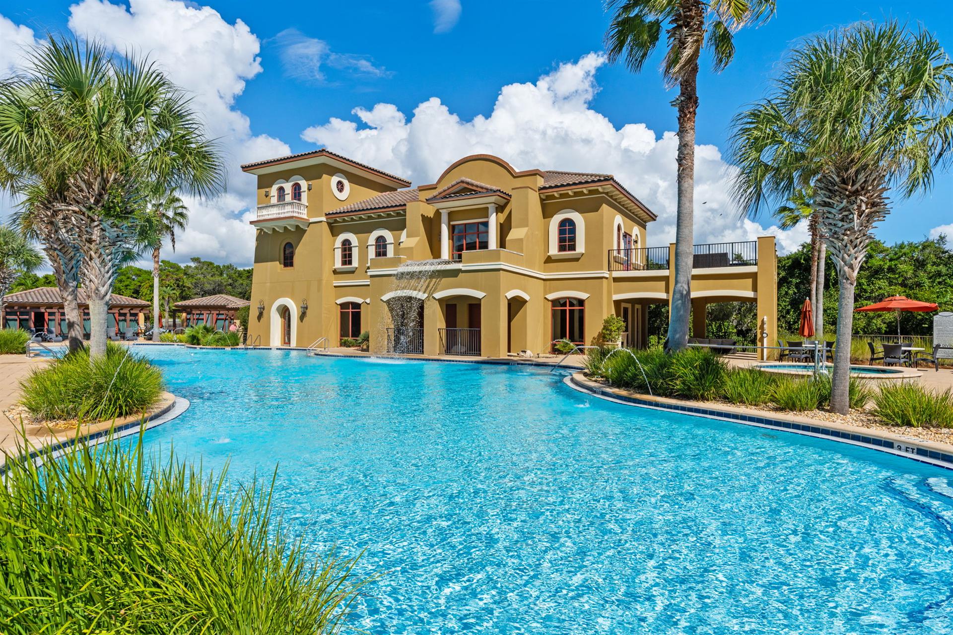 Onsite Clubhouse and One of Three Pools on Property