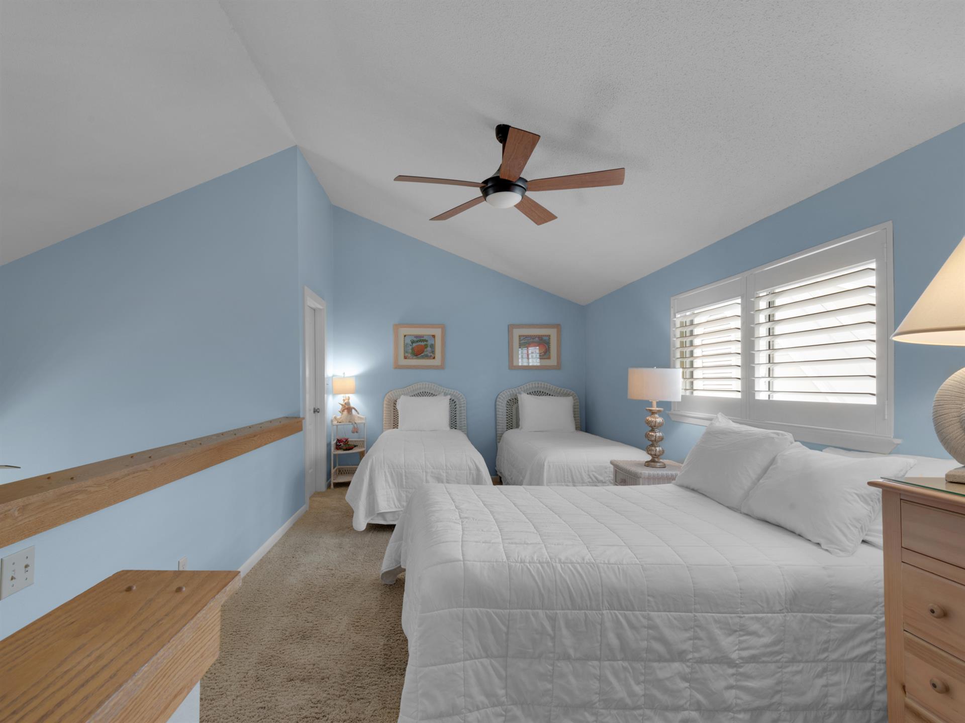 Bedroom 3 With 2 Twin and a Double Bed