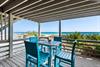 The lower level balcony offers direct access to the Gulf