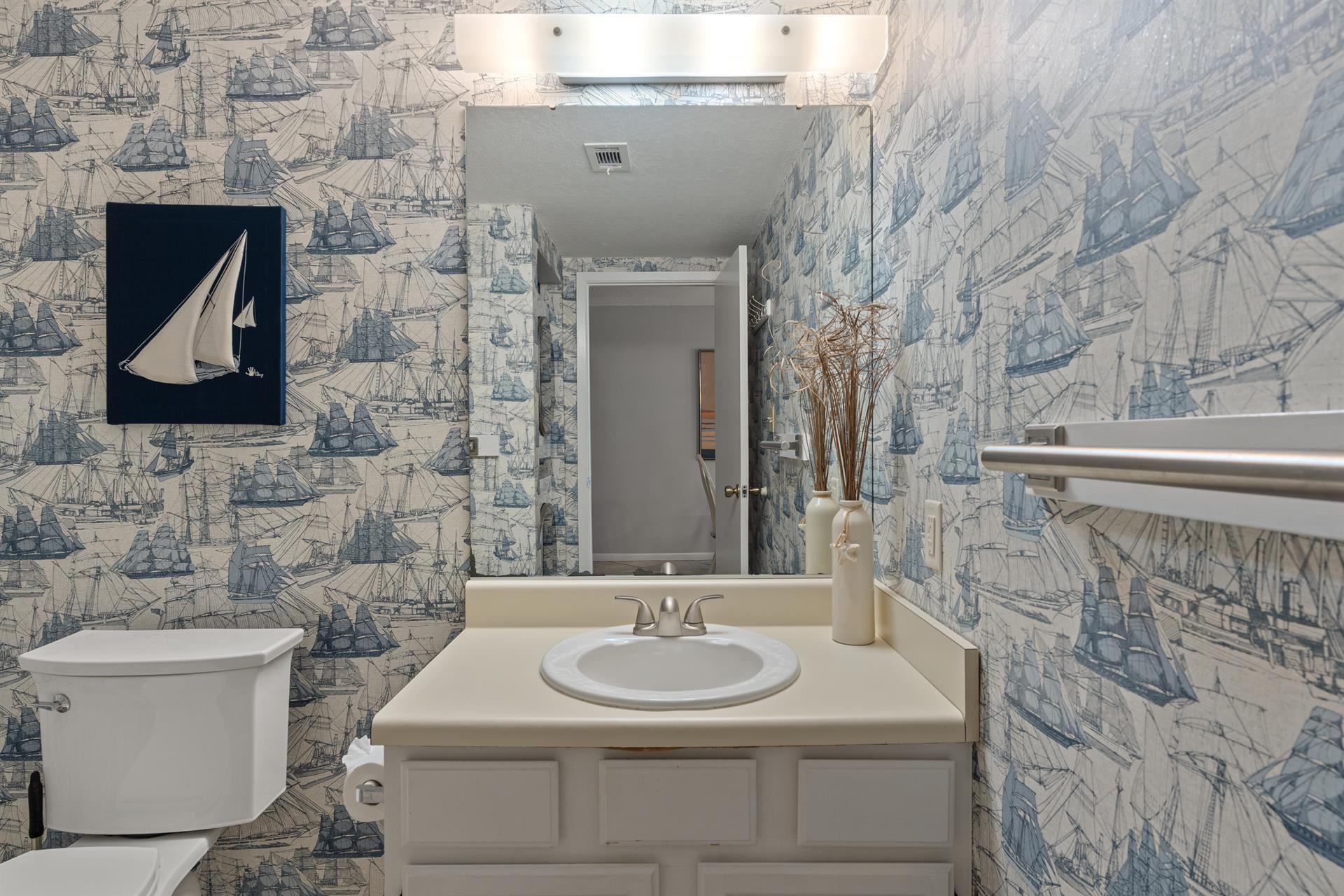 Convenient half bathroom located on the 1st floor