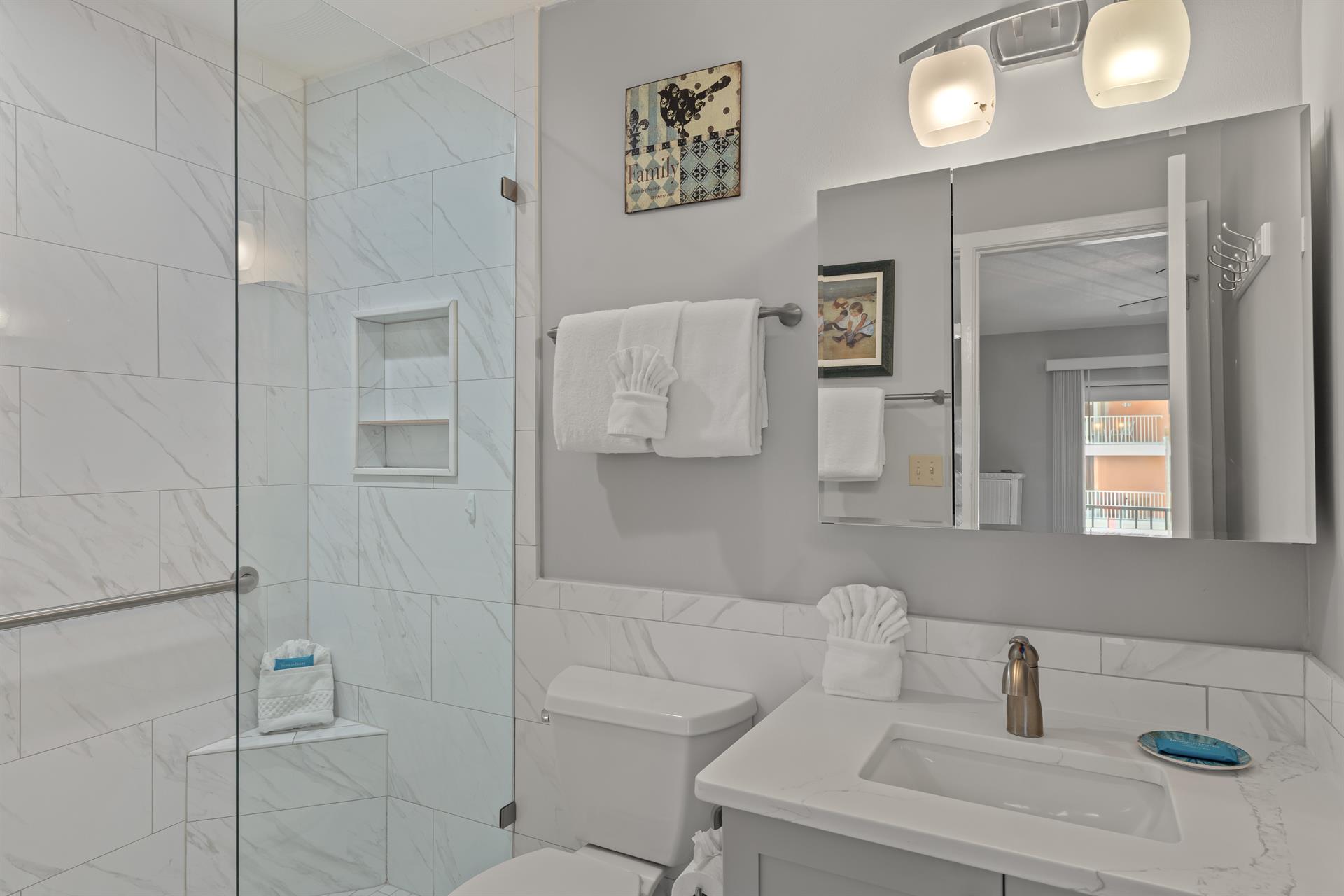 Bathroom 1 featuring walkin shower