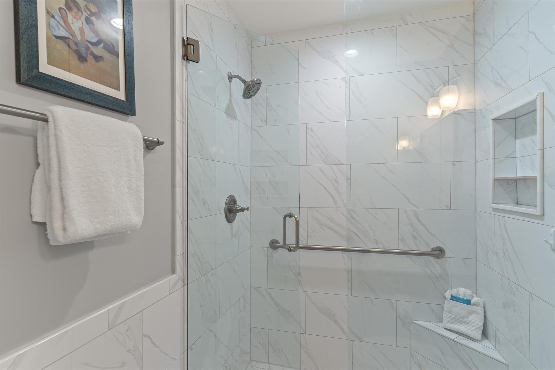Bathroom 1 walkin shower and convenient shower bench