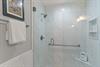 Bathroom 1 walkin shower and convenient shower bench