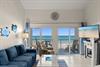Your private sanctuary awaits with sweeping ocean views framing every moment. Relax in coastal comfort as turquoise waves greet you each morning through expansive balcony doors.