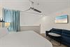 2nd floor LOFT bedroom 2 with King bed  heavy custom curtain for privacy from living area below