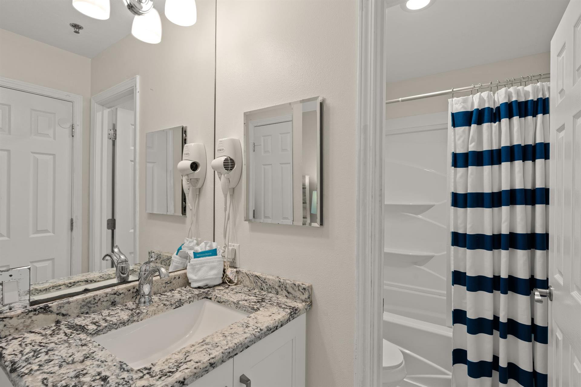 2nd floor LOFT shared bathroom with open vanity area, door for privacy in shower and toilet room