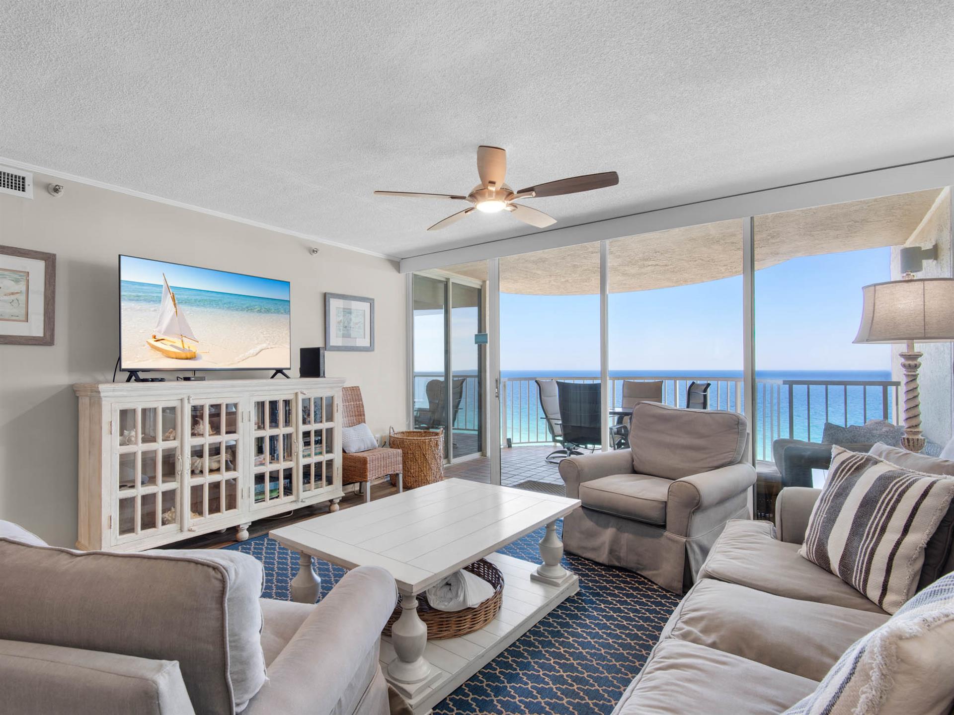 Sink into plush sofas and let the endless turquoise horizon melt your stress away through panoramic glass doors opening to your private oceanfront balcony.