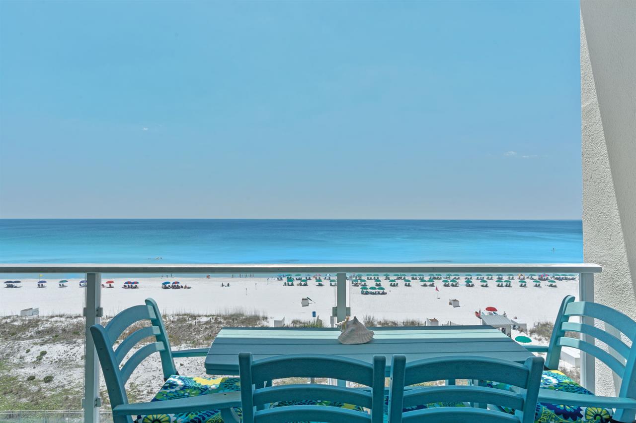 Relax with cocktail or meal on the Private Gulf front balcony