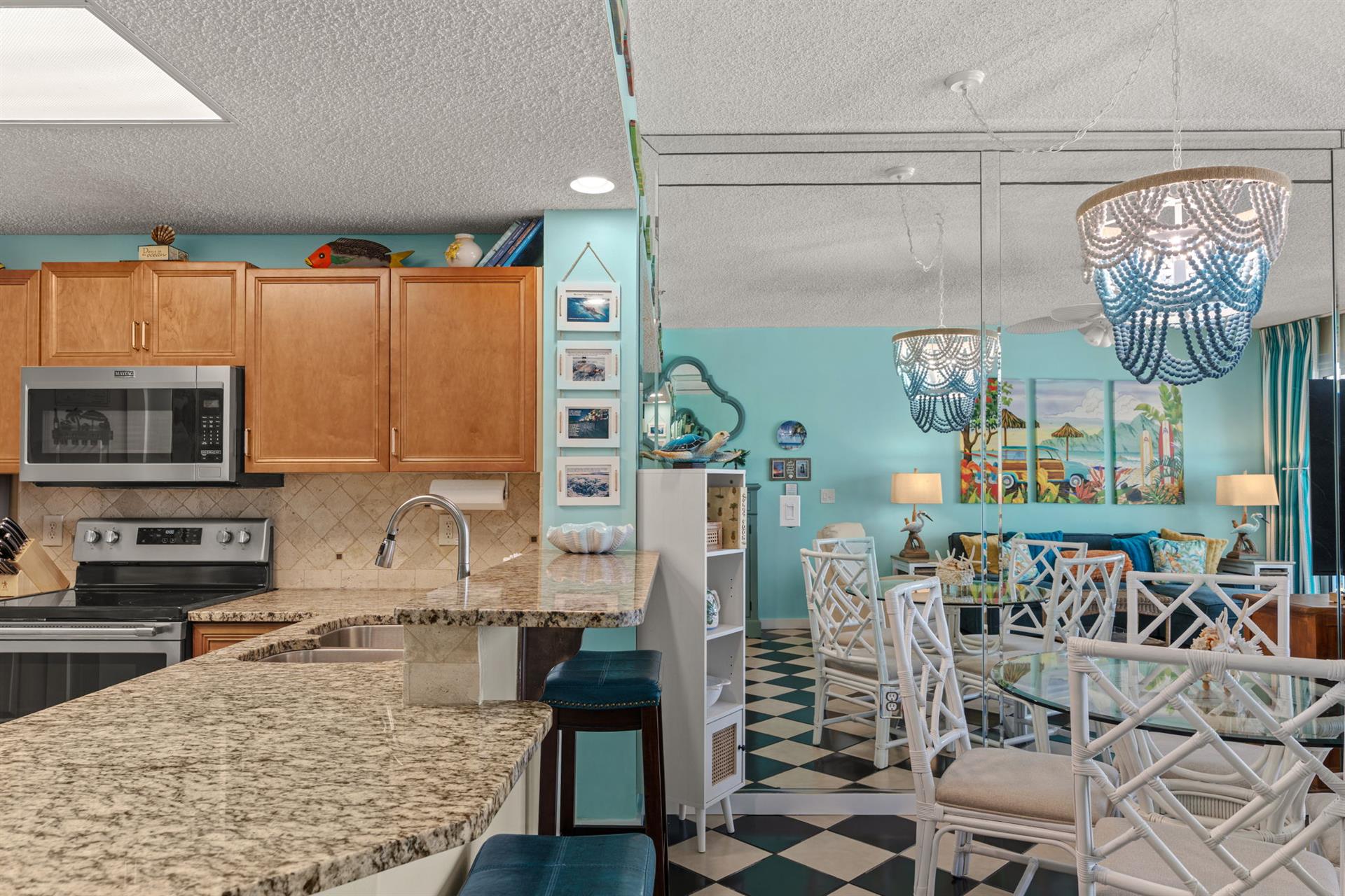 Kitchen with Bar Seating open to Dining Area