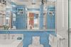 Bathroom 1 Vanity Opens to interior mirrors, allowing guests to see all angles