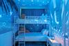 Cozy bunk beds and twinkling lights create a magical hideaway that makes bedtime an adventure children will treasure.