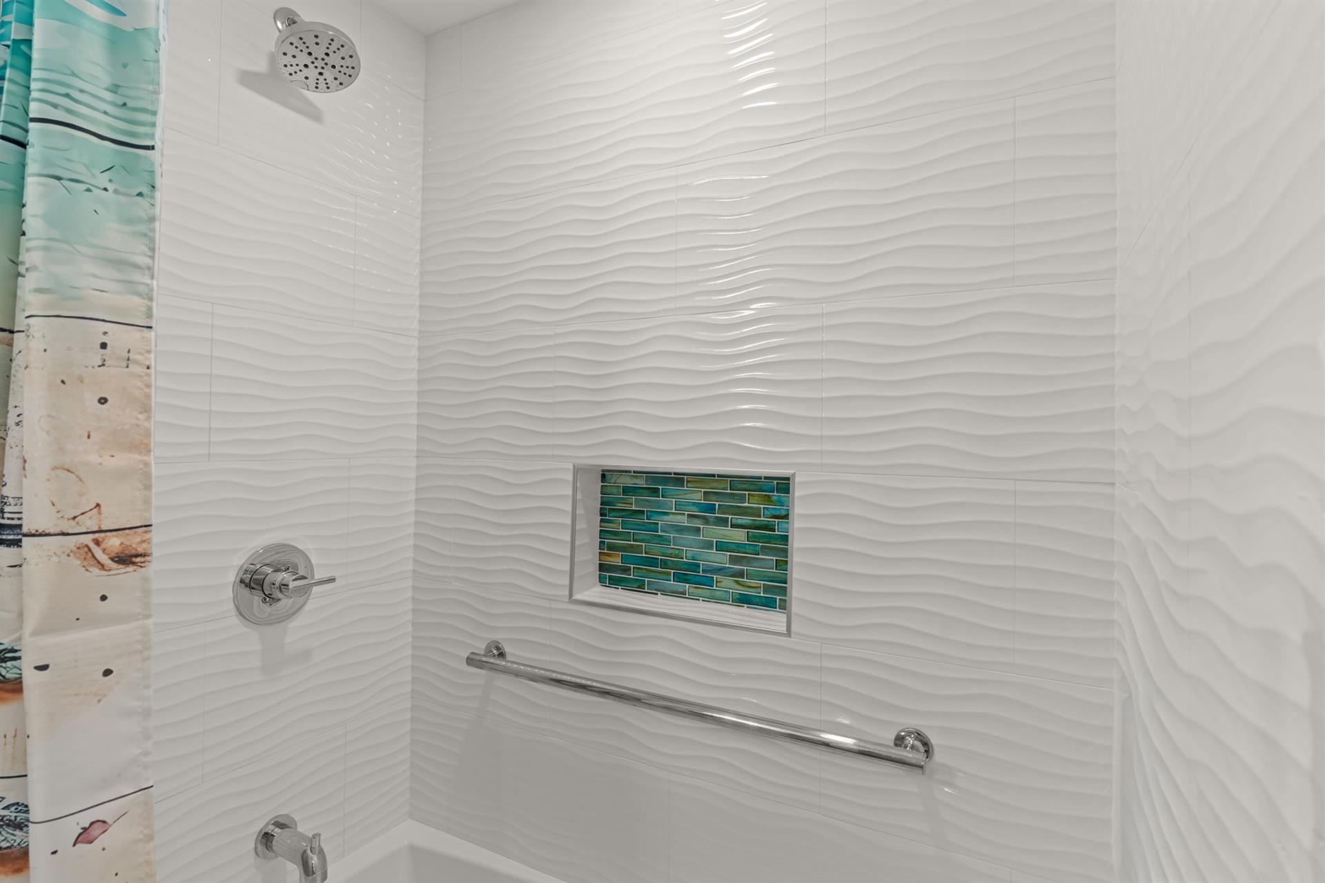 Grab bar located in Bathroom 2
