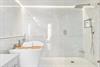 WalkIn Shower and Soaking Tub in Primary Bathroom