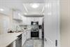 The gourmet kitchen sets the stage for delicious meals and cozy gatherings