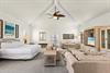 Soaring vaulted ceilings, plush seating, and beachinspired artwork create a serene coastal retreat