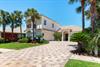 A Mediterraneanstyle vacation home showcasing elegant tile roof architecture