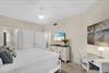 A dedicated workspace helps you catch up effortlessly in this wellappointed guest bedroom