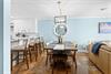 Gather around your spacious dining table for memorable meals, with an open kitchen perfect for easy entertaining.