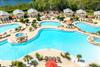 Aerial view of an expansive resortstyle pool complex with Pool Cabanas