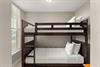 Your kids will love this cozy bunk room with plenty of natural light, perfect for restful nights after funfilled days.