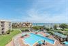 Breathtaking views of the Gulf, pool, and dunes from your large private balcony.