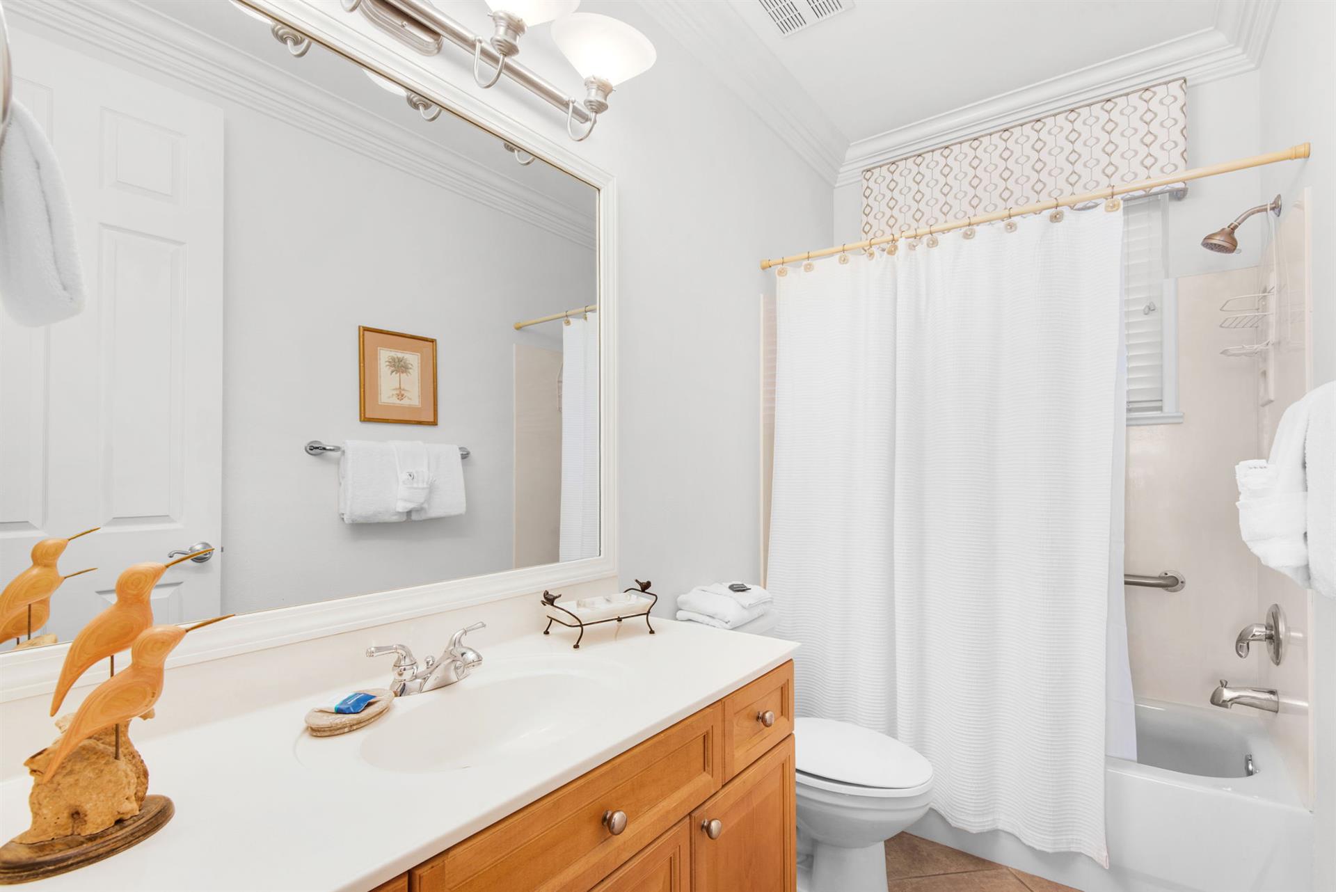 Your private bathroom offers a vanity, showertub combo, and all the essentials youll need to refresh after a day of exploring.