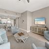 Settle into your bright, open living space with coastal colors and a relaxing vibe where you can unwind after beach days and enjoy your favorite shows.