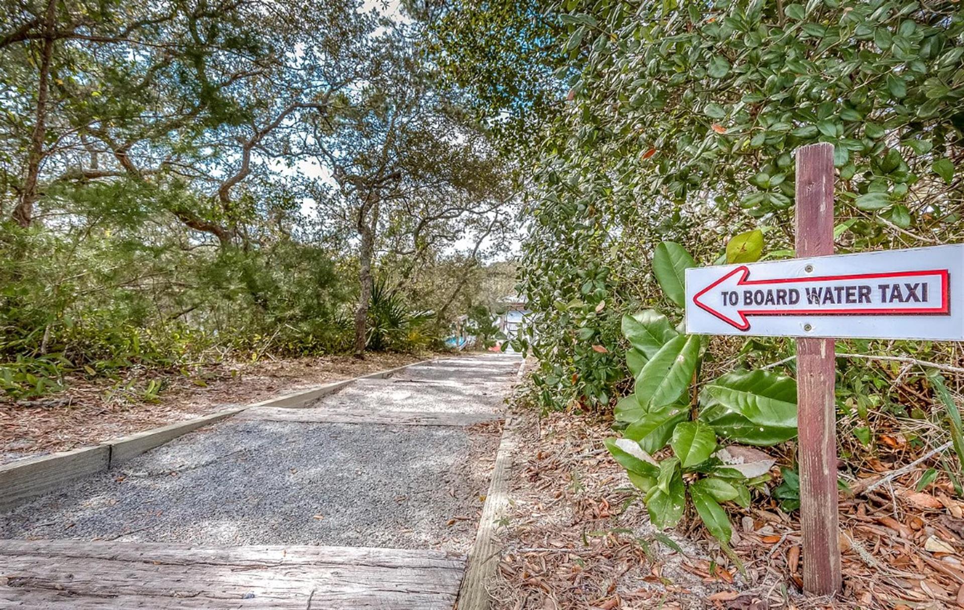 Path to seasonal Water Taxi located Southside of pool area