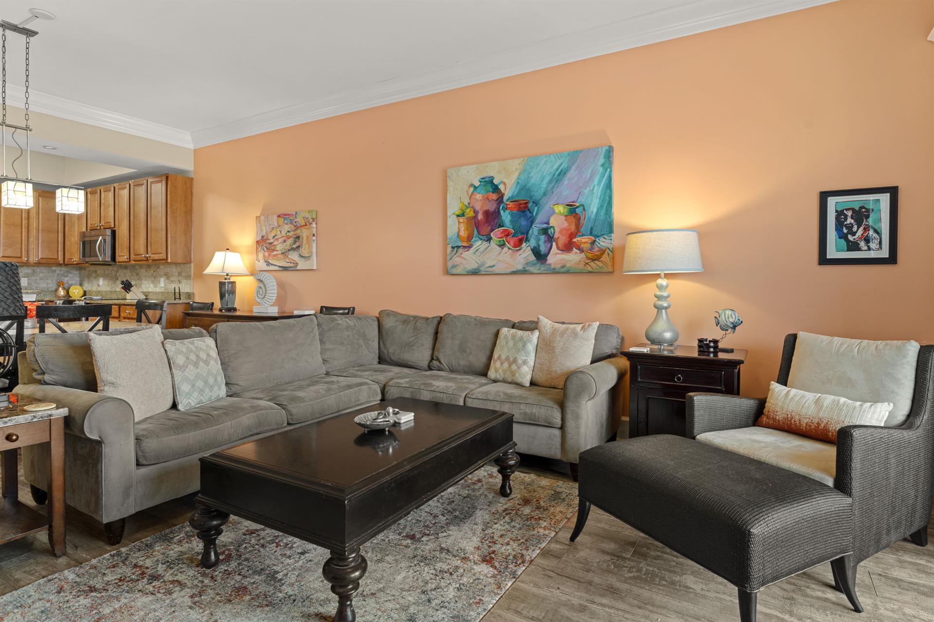Openconcept living space, where warm tones and curated artwork create a relaxing retreat after your beach or lake adventures.