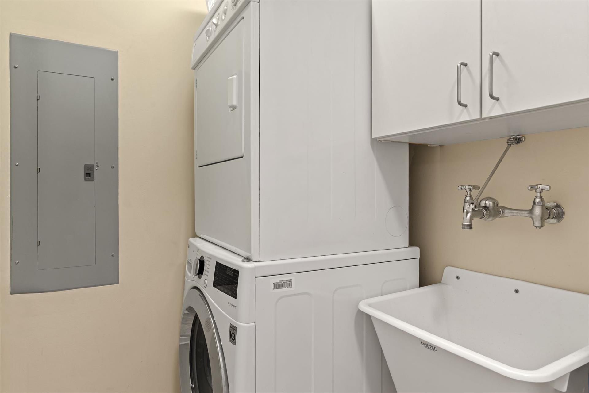 Washer and Dryer located in hallway