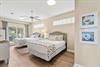 This spacious bedroom features two queen beds and a calming palette that invites deep rest after a day of adventure.