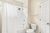 Refresh in your private bathroom with a full tubshower combo, and soft natural light streaming through the window.