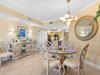 The dining area flows into the kitchen, creating the perfect space for memorable meals together