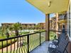 The private balcony with garden and pool views.
